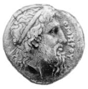 Монета IV века до н. э., отчеканенная на острове Хиос, где, по преданию, был похоронен Гомер. На монете - имя Гомера и его изображение с широко открытыми зоркими глазами